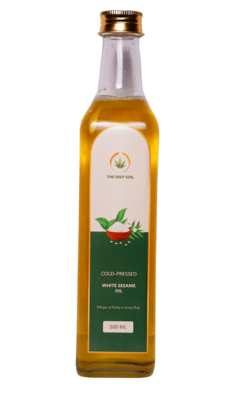 Cold-pressed white sesame oil in glass bottle by The Deep Soil, traditionally extracted and rich in natural nutrients.
