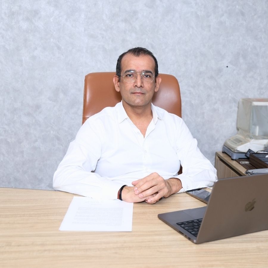 Mr. Shashank Gupta, Founder of The Deep Soil and MaxxGro Agrology, seated at his office desk.