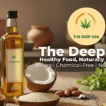 Bottle of The Deep Soil pure cold-pressed almond oil on a wooden table with raw almonds and coconut.